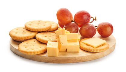 Board with tasty crackers, grapes and cheese on white background
