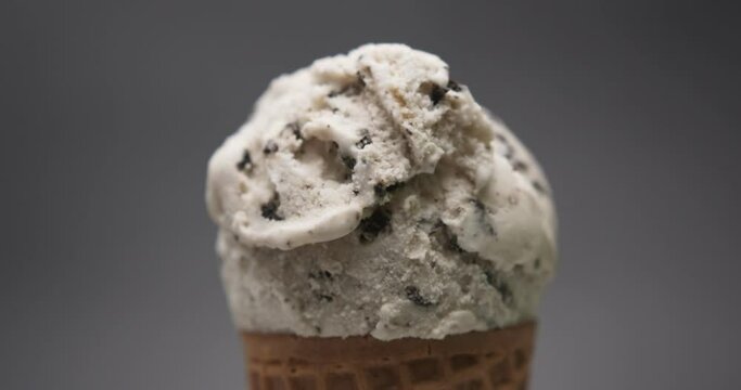Close up zoom in detail - Ice cream Cookies and Cream isolated on black Background.