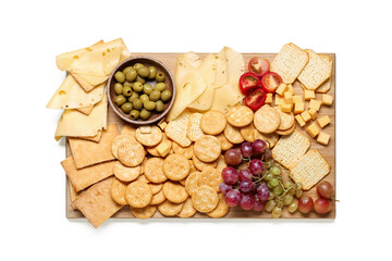 Board with tasty crackers and cheese on white background