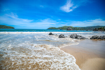 Beautiful beach at famous beach, rock, sun, water and island, amazing Seychelles with unique franite rocks