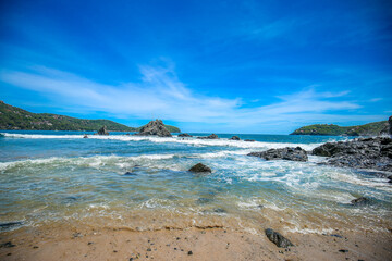 Beautiful beach at famous beach, rock, sun, water and island