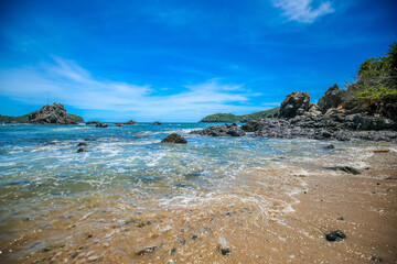 sunset on the beach with a huge rock, tropical beach paradise in Mexico