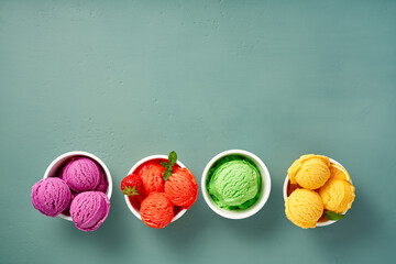 Gourmet flavours of Italian ice cream in vibrant colors served in individual ice cream paper cups...
