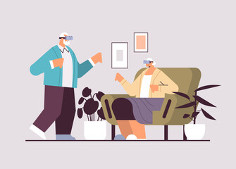 senior couple wearing vr headset grandparents in digital glasses exploring virtual reality interactive services active old age