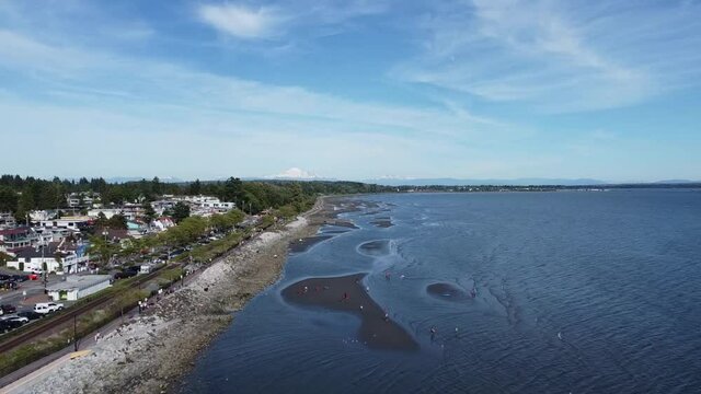 Flying over beach in White Rock, BC, Canada
