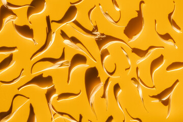 Delicate peony petals texture pattern. Natural graceful flowers under the sunlight on a bright yellow background