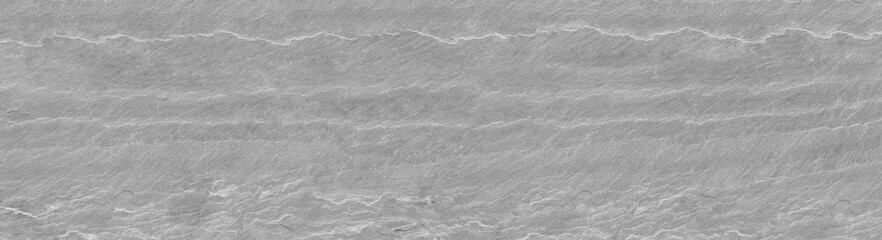 Gray grunge banner. Abstract stone background. The texture of the stone wall. Close-up. Light gray rock backdrop
