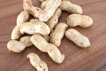 Peanuts on cutting board