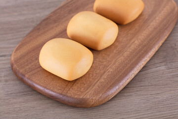 Small bread on cutting board