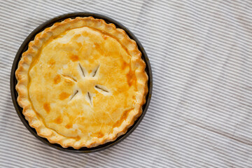 A Piece of Chicken Pot Pie, top view. Flat lay, overhead, from above. Copy space.