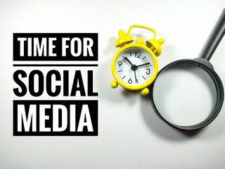 Text TIME FOR SOCIAL MEDIA with alarm clock and magnifying glass on white background.