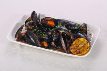 Tasty delicous boiled Mussels with herbs