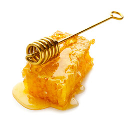 Dipper and honeycomb on white background