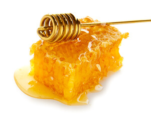 Dipper and honeycomb on white background