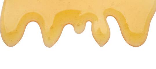 Spilled honey on white background