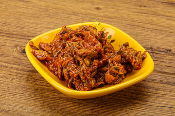 Canned anchovy in tomato sauce