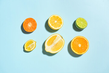 Healthy citrus fruits on color background