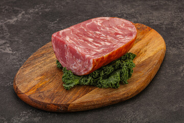 Beef ham piece over board