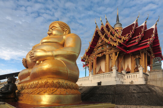 Golden Sitting Buddha Statue (Katyayana) at Wat Pa Phu Hai Long