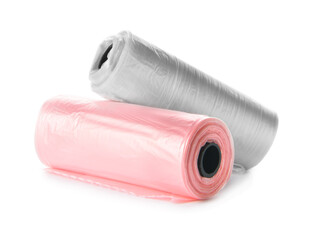 Rolls of pet waste bags on white background
