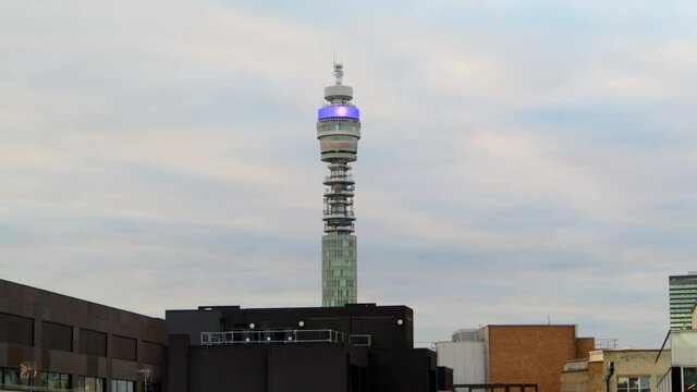 A view of the BT Tower in London on a dramatic city skyline in summer