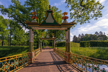 View of the Small Chinese Bridge in the Alexander Park of Tsarskoye Selo on a sunny summer evening,...
