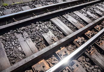 railway tracks on which trains run on a summer day. travel and transportation