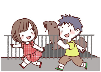 動物園ではしゃぐ子供たち