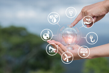 Light bulb Energy saving green nature background with icons

