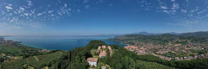 Aerial panorama Monastery on the hill. Monastery on the Eremo di San Giorgio hill,.Lake Garda,...
