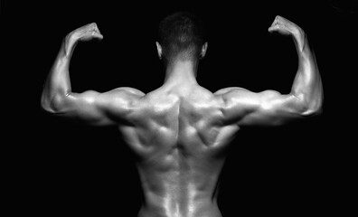 Obraz na płótnie Canvas bodybuilders male back. Naked body muscular Man