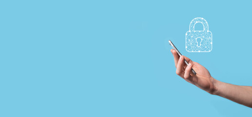 Male hand holding a lock padlock icon.Cyber security network. Internet technology networking.Protecting data personal information on tablet. Data protection privacy concept. GDPR. EU.Banner