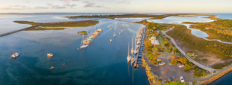 Aerial view of a boats and yachts anchored at a coastal marina