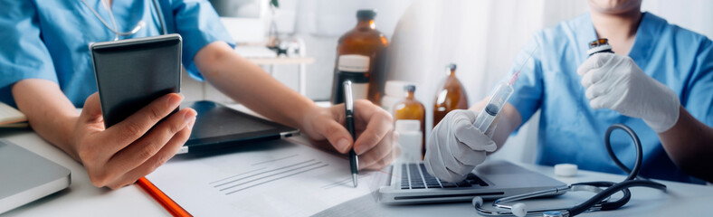 vaccine Concept fight against virus covid-19 corona virus, doctor or scientist in laboratory holding a syringe with liquid vaccines for children or older adults, diseases, medical care, science.