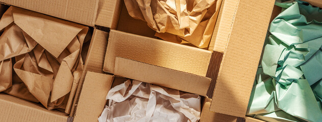 Recycled packaging ,Cardboard boxes with crumpled paper inside for packaging goods from online...