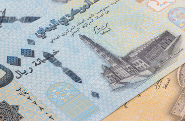 Close up to Rial, banknotes of the republic of Yemen. Detailed capture of the front art design of Rials. Detailed money background wallpaper. Currency banknotes of the Arabic country. 500 Rial Yemen