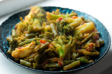 Organic vegan food. Plate of vegetables close