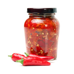 glass jar with red peppers