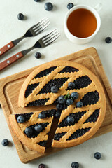 Concept of delicious breakfast with blueberry pie