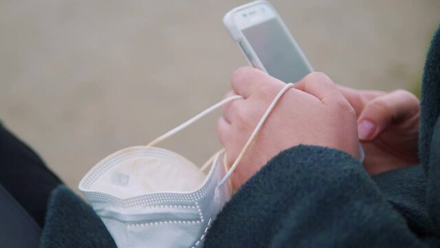 Woman writes a message during pandemic in 4k slow motion 60fps