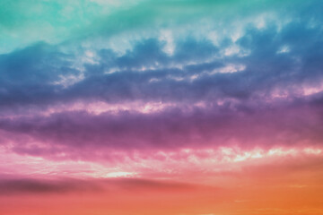 Colorful cloudy sky at sunset. Gradient color. Sky texture. Abstract nature background