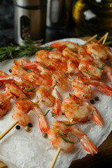 Concept of tasty eating with grilled shrimps, close up