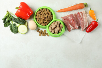 Concept of organic pet food on white textured background