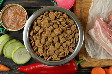 Concept of organic pet food on wooden background