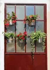 Door of an house decorated with flowers