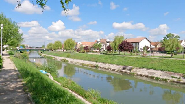 A scenic view of Bega river by the park at Timisoara, Romania in 4K