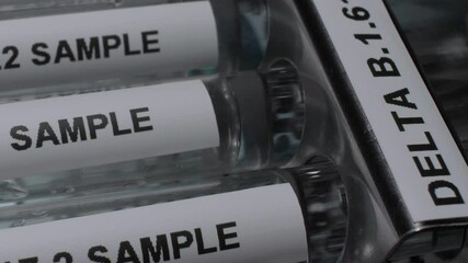 Delta B.1.617.2 Indian Variant Test Tube Vials In Rack. Vertical Video, Pan Up, Close Up