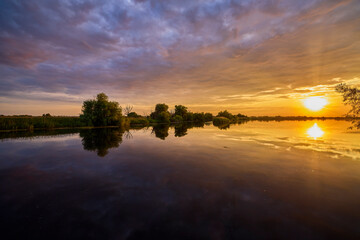 Fototapeta na wymiar Beautiful landscape with sunset in the Danube Delta, Romania