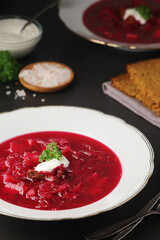 A plate with Ukrainian national dish - borsch