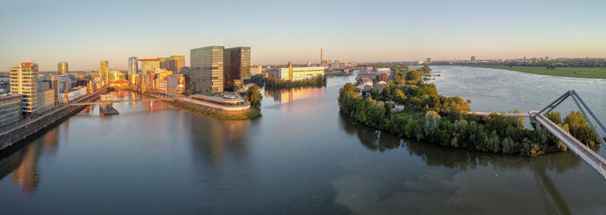 Fototapeta na wymiar Modern Architecture at the Media Harbour at sunrise; Düsseldorf, North Rhine Westphalia, Germany